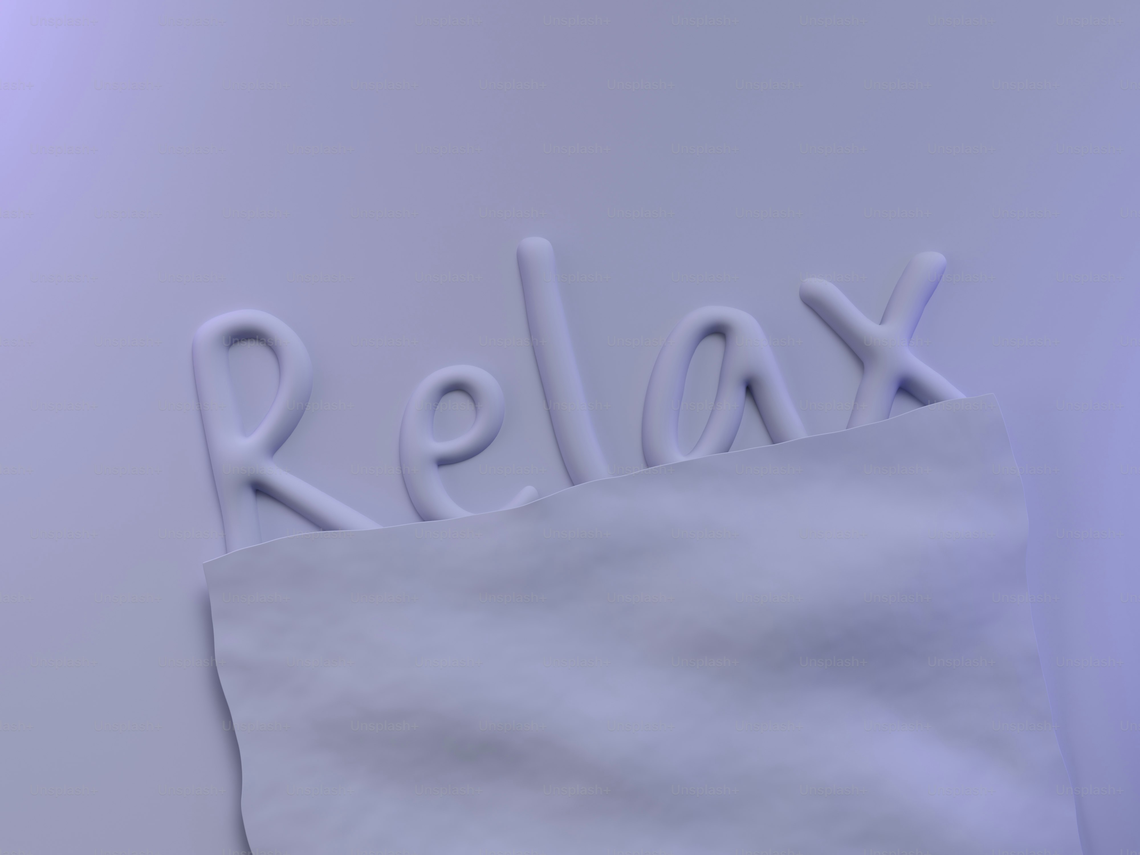 a close up of a piece of paper with the word relax on it